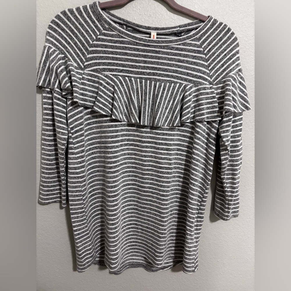Orange Creek women’s round neck tee with ruffle